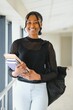 portrait of happy female african american college student