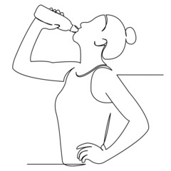 girl athlete drinks water