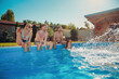© Impact Photography - Friends having fun at the swimming pool
