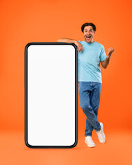 Poster - Yes. Man leaning on white empty smartphone screen celebrating success