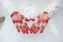 Woman Hand With Red Henna
