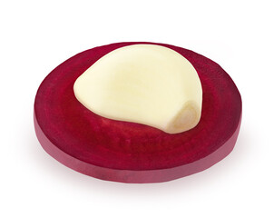 Wall Mural - Vegetable composition: slice of red beet and garlic clove isolated on a white background.