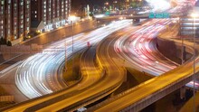 Time Lapse traffic on the I-75 - I-85 freeway at night as it goes through Downtown Atlanta