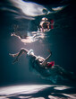 © Helen - Young woman underwater in a beautiful dress underwater shooting