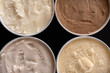 © angelsesa - Helado cremoso de varios sabores, servicio para llevar, fondo negro, toma contrapicada, geometría