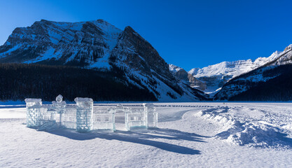 Wall Mural - Lake Louise winter festival ice carving and ice skating rink. Banff National Park, Canadian Rockies. Alberta, Canada.