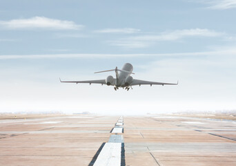 Wall Mural - Modern corporate business jet take off from airport runway