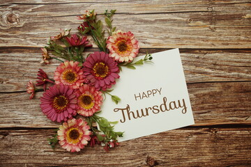 Poster - Happy Thursday typography text with flowers on wooden background