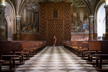 Traveler Young Girl At The Big Wooden Door Of The Church