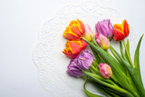 Fototapeta Tulipany - Bunch of spring tulip flower  on white background