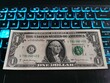 dollars on the keyboard