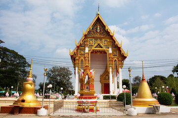 Ancient antique ubosot ordination halls building of Wat Phang Muang temple for thai people travel visit respect praying buddha deity in Si Prachan district at Suphanburi city in Suphan Buri, Thailand