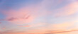 Leinwandbild Motiv light blue and pink pastel colored panorama sky with clouds