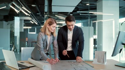 Group of engineer architectural. Team Architect Design Project Meeting Discussion working with partner tools on model building and blueprint. Construction developer designer inspect the plan in office
