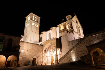 Wall Mural - Assisi Basilica by night,  Umbria region, Italy. The town is famous for the most important Italian Basilica dedicated to St. Francis - San Francesco.