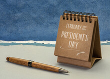 February 3rd Monday, Presidents Day, The Birhtday Of George Washington - Handwriting In A Spiral Desktop Calendar Against Abstract Paper Landscape, Calendar Concept