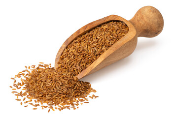 Poster - Roasted cumin seeds in the wooden scoop, isolated on the white background.