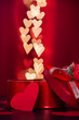 Open heart shaped gift box with heart shaped bokeh lights backgournds
