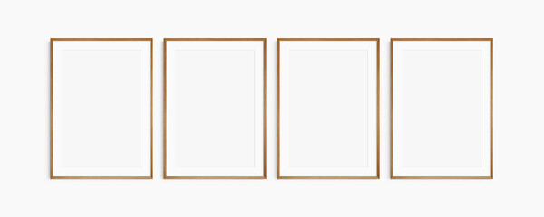 Frame mockup 5x7, 50x70, A4, A3, A2, A1. Set of four thin cherry wood frames. Gallery wall mockup, set of 4 frames. Clean, modern, minimalist, bright. Portrait. Vertical. Mat opening 2:3.