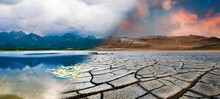 Landscape With Mountains And A Lake And A Dried Desert. Global Climate Change Concept