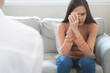 © Pormezz - Young woman in a mental therapy session talking with a psychologist in the office.