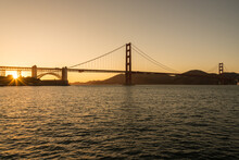 Sunset. The Golden Gate Bridge During The Golden Hour