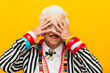 © oneinchpunch - Funny grandmother portraits. Senior old woman dressing elegant for a special event. granny fashion model on colored backgrounds