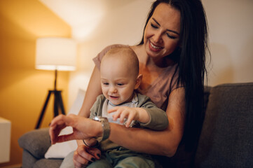 Mom enjoying time with her toddler son at home