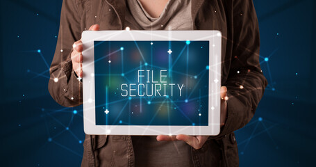 Person holding tablet, security concept