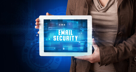 Person holding tablet, security concept