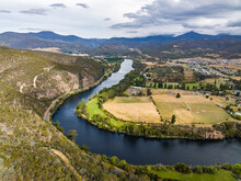 High Angle Aerial Drone View Of River Derwent, One Of The Major Rivers On The Island Of Tasmania, Australia, Near The Town Of New Norfolk, 30 Kilometres From Tasmanias Capital City Hobart.	