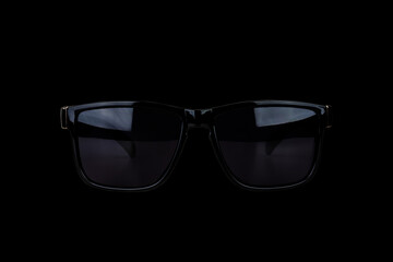 black male sunglasses isolated on black background