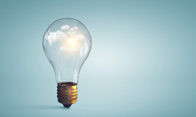 Canvas Print - Light bulb on light blue background