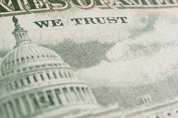 American paper money background. Fragment of reverse of $50 bill showing the Capitol. US banknote closeup. Backdrop about public national debt and the USA dollar. Bonds and treasurys. Macro