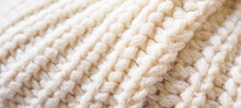 Closeup Beige Knitted Woolen Fabric Texture Background