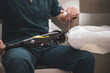 detail of an orthopedist fixing a prosthetic leg for an athlete.bionic leg.