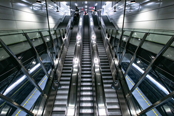 Wall Mural - A top view of an escalator in a modern building