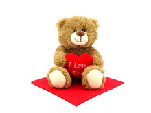 Brown Teddy Bear Holding Red Heart With Text 'I Love You', Isolated On White Background.