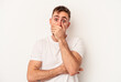 © Asier - Young caucasian man isolated on white background who feels sad and pensive, looking at copy space.