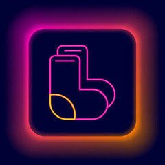 Sticker - Glowing neon line Valenki icon isolated on black background. National Russian winter footwear. Traditional warm boots in Russia. Colorful outline concept. Vector