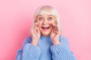 Poster - Photo of mature excited lady arms near mouth yell advertise discount isolated over pink color background