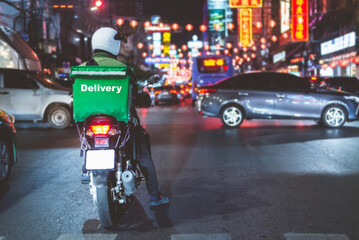 Food delivery drivers are driving to deliver products to customers who order online. Impact of epidemics