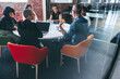 © Jacob Lund - Male supervisor briefing his team in the morning