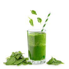 Green Vegetarian Fitness Smoothie Made Of Raw Spinach Leaves Which Are Source Of Vitamins And Dietary Fiber Used For Healthy Vegan Dieting And Weight Loss Served In Glass With Straw Isolated On White