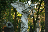 Fototapeta  - A tombstone sculpture at the Powazki (Pow¹zki) Cemetery, Warsaw, Poland