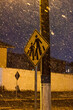Traffic sign and snow falling at night - Lages, Serra Catarinense, Brasil