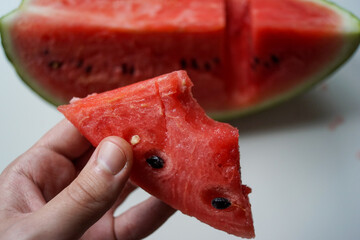 Sticker - A closeup of a fresh watermelon on a white background