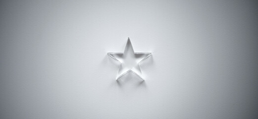 A small transparent glass star on a white background. The winner's small prize. A bright star is a souvenir.