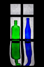 Still Life With Green And Blue Bottles Against The Window