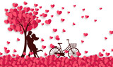Couple hugging at a field of paper hearts and having a bicycle.
